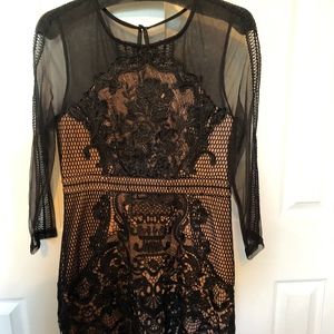 L'Atiste black and flesh tone dress, size Large